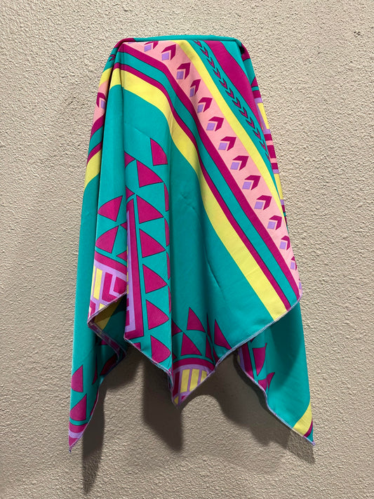 Bright teal, pink, and yellow tribal